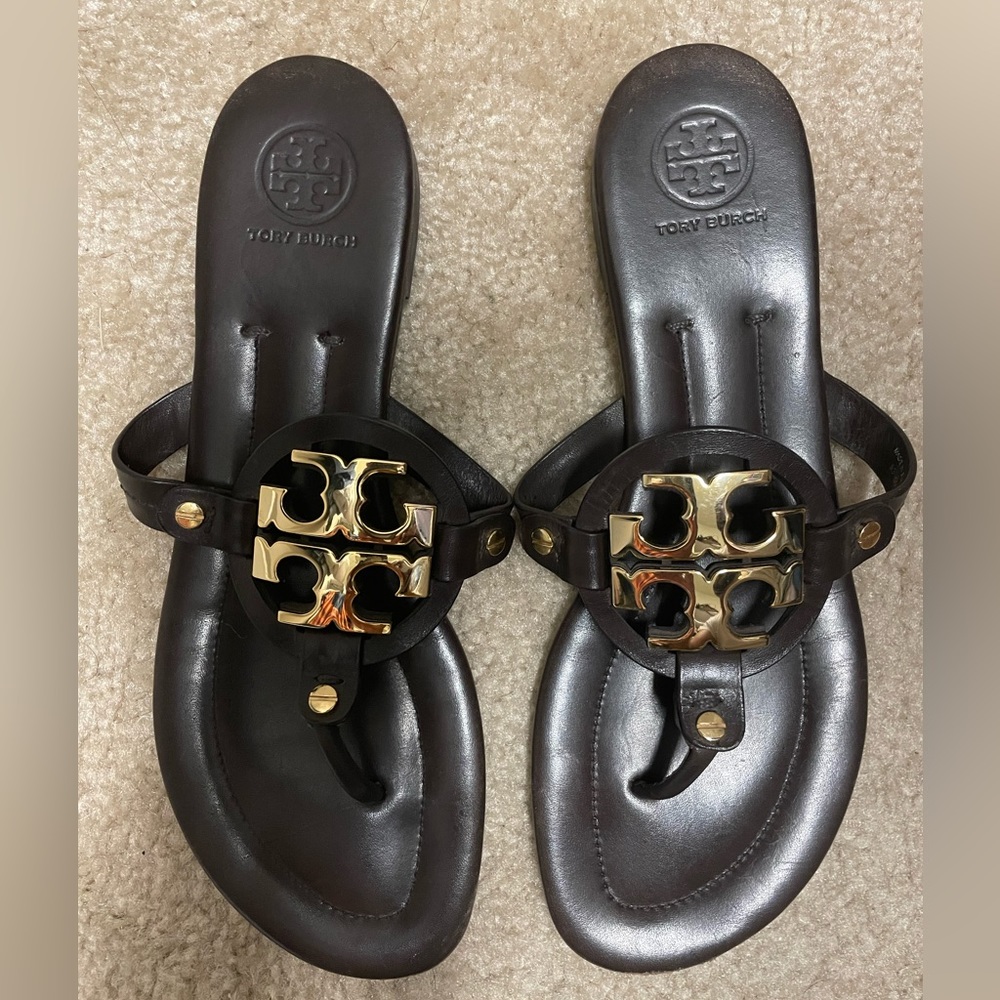“SOLD” Tory Burch Miller in brown with metal logo